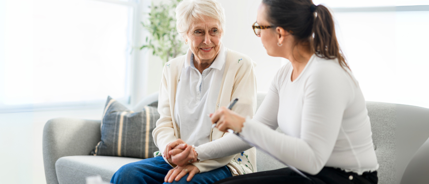 Adult woman speaks with her mother about senior living decisions